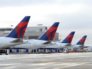 2 charged with stealing $22 million from Delta