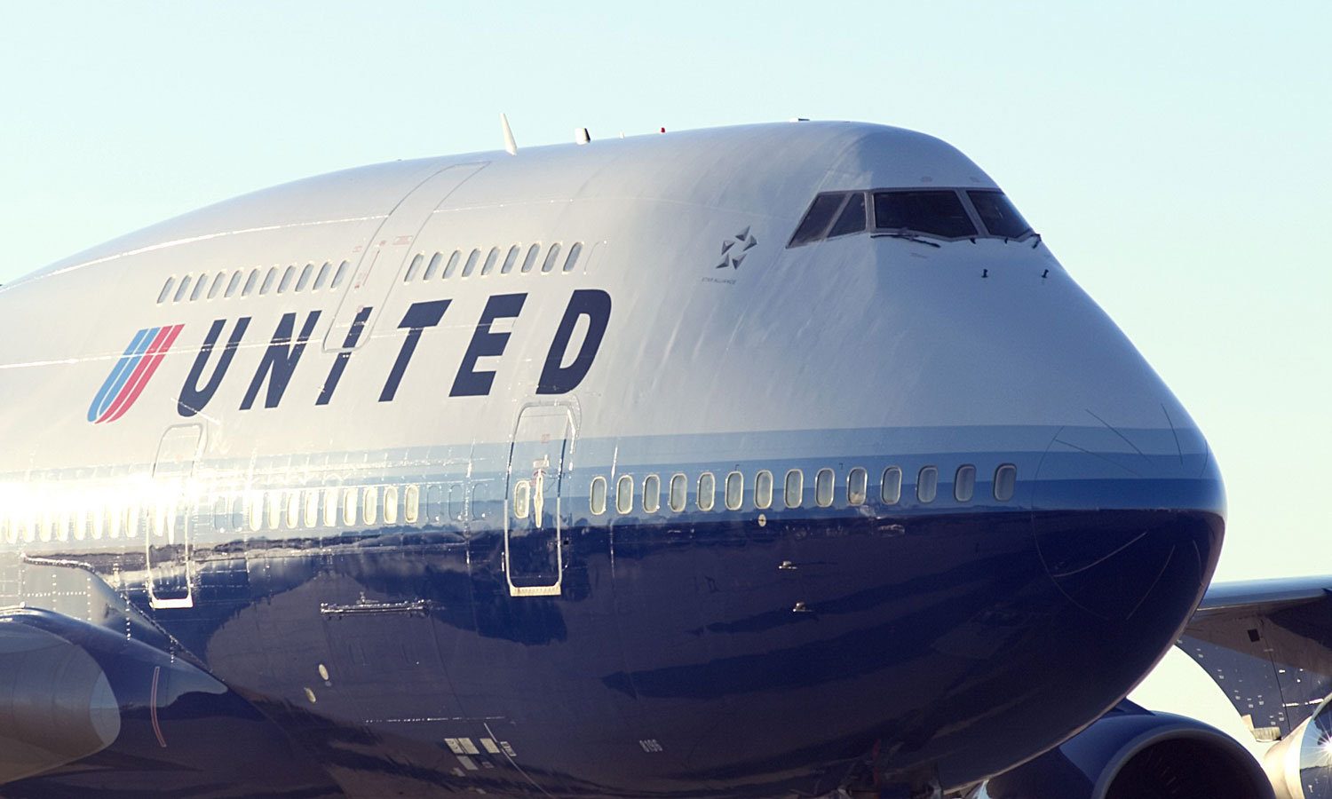 United changes frequent flyer program to match Delta's
