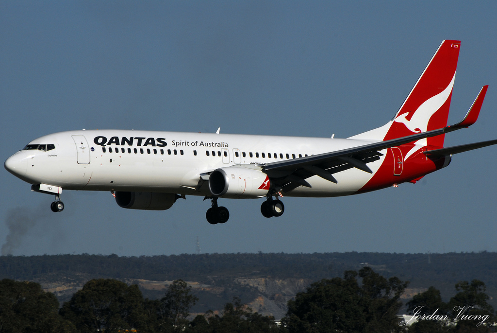 Qantas announces $203m half-year net profit