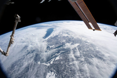 a satellite in space above the earth