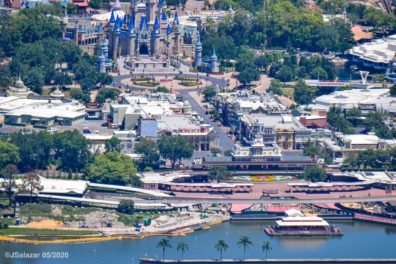 a city with a castle and a river