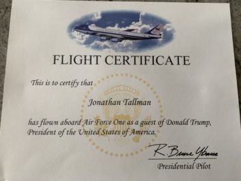 a certificate of flight with a picture of an airplane